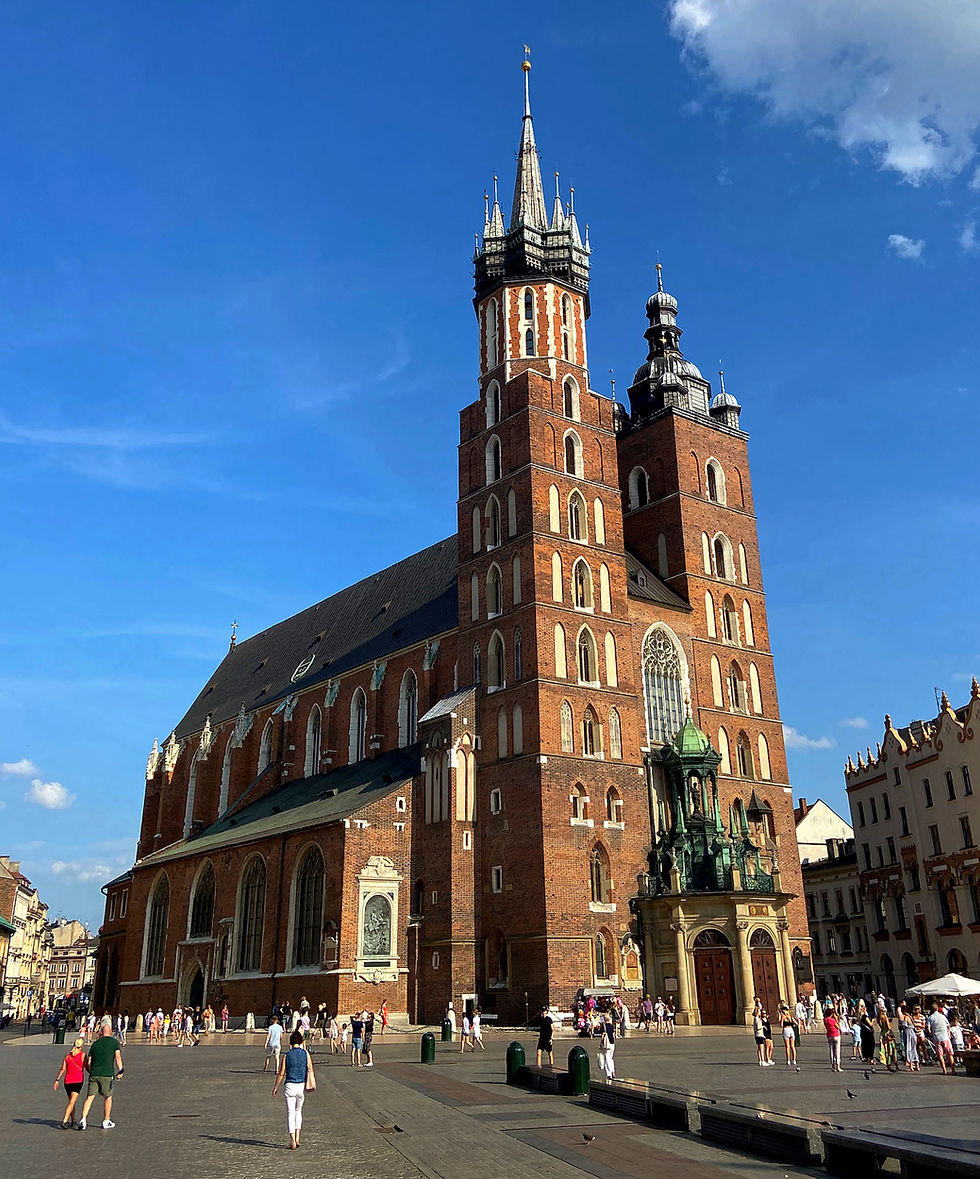 A trumpeter can be seen and heard playing every hour from the tower of St. Mary's Basilica in Kraków, Poland.