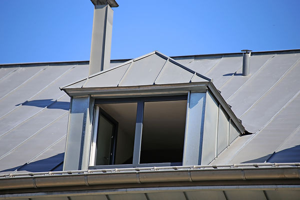 dormer-with-zinc-cladding-on-a-tiled-roo