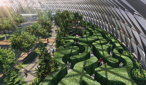 The Hedge Maze at The Jewel at Changi Airport, Singapore, designed by Adrian Fisher Design and showing the maze and the lookout tower at the maze's goal.