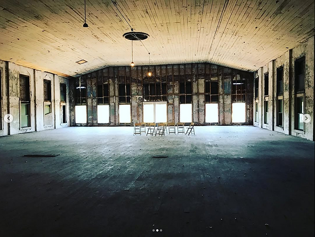 Bare walls and floor of the future ballroom of Hotel Monroe 