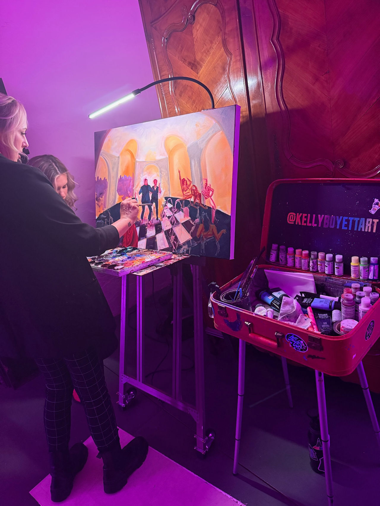 Live Painter Kelly Boyett during the reception at Latrobe's
