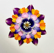 mandala design made of bright pressed flower petals