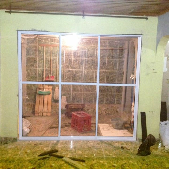 Ventana de tres hojas tracera