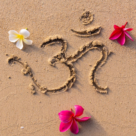 The Meaning Behind The Om Symbol & Sound, Plus How To Use It Respectfully by Sarah Regan