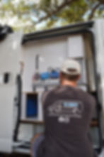 AcDarcy working on a Hiace off grid system