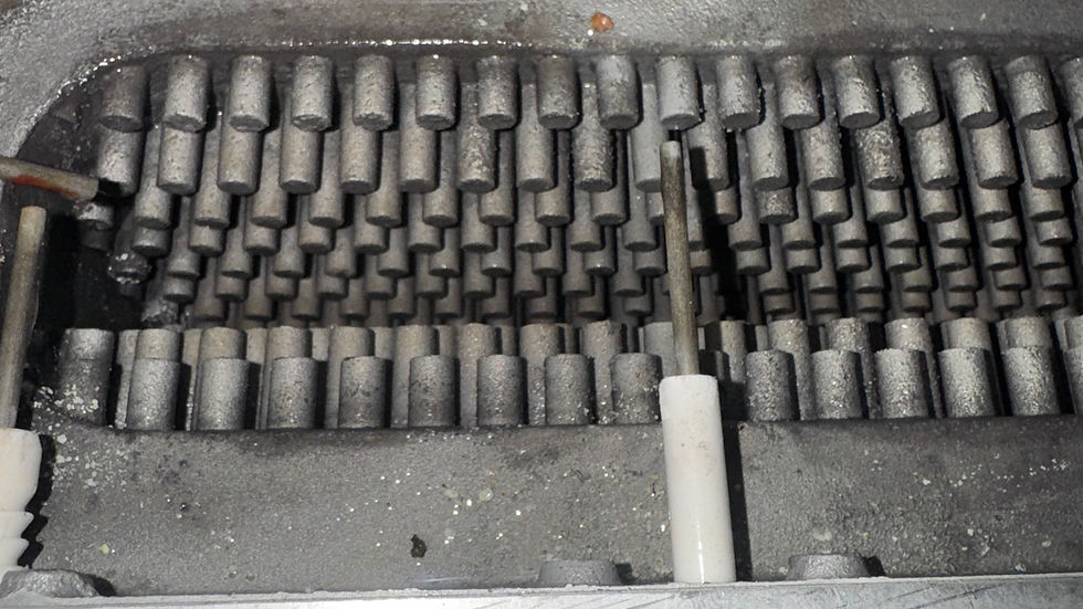 Close-up view of a boiler control panel being inspected