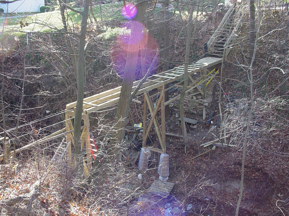 new wood bridge being built 