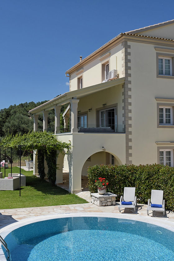 The imposing Damianos House, seen from the poolside