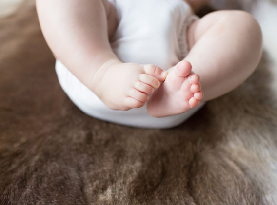 Baby wearing a cloth nappy