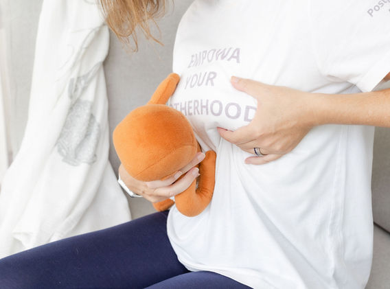 Kathy Rougier demonstrating breastfeeding techniques