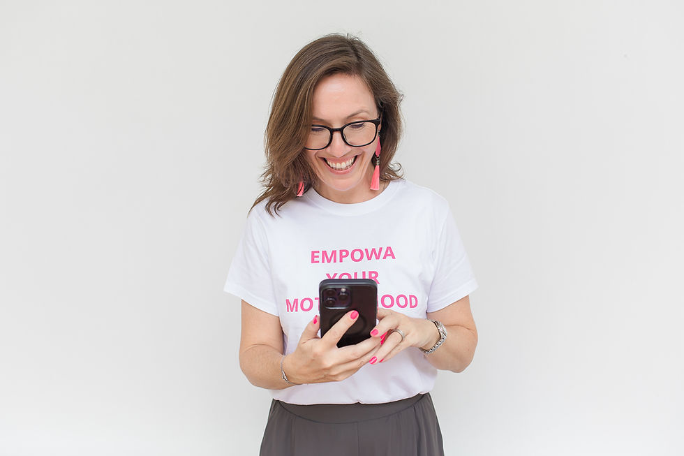 Kathy Rougier smiling at her phone