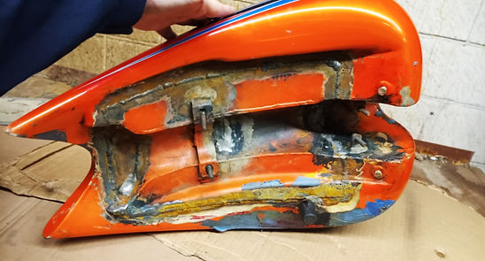 Clean bike tank welded back together, ready to coat inside