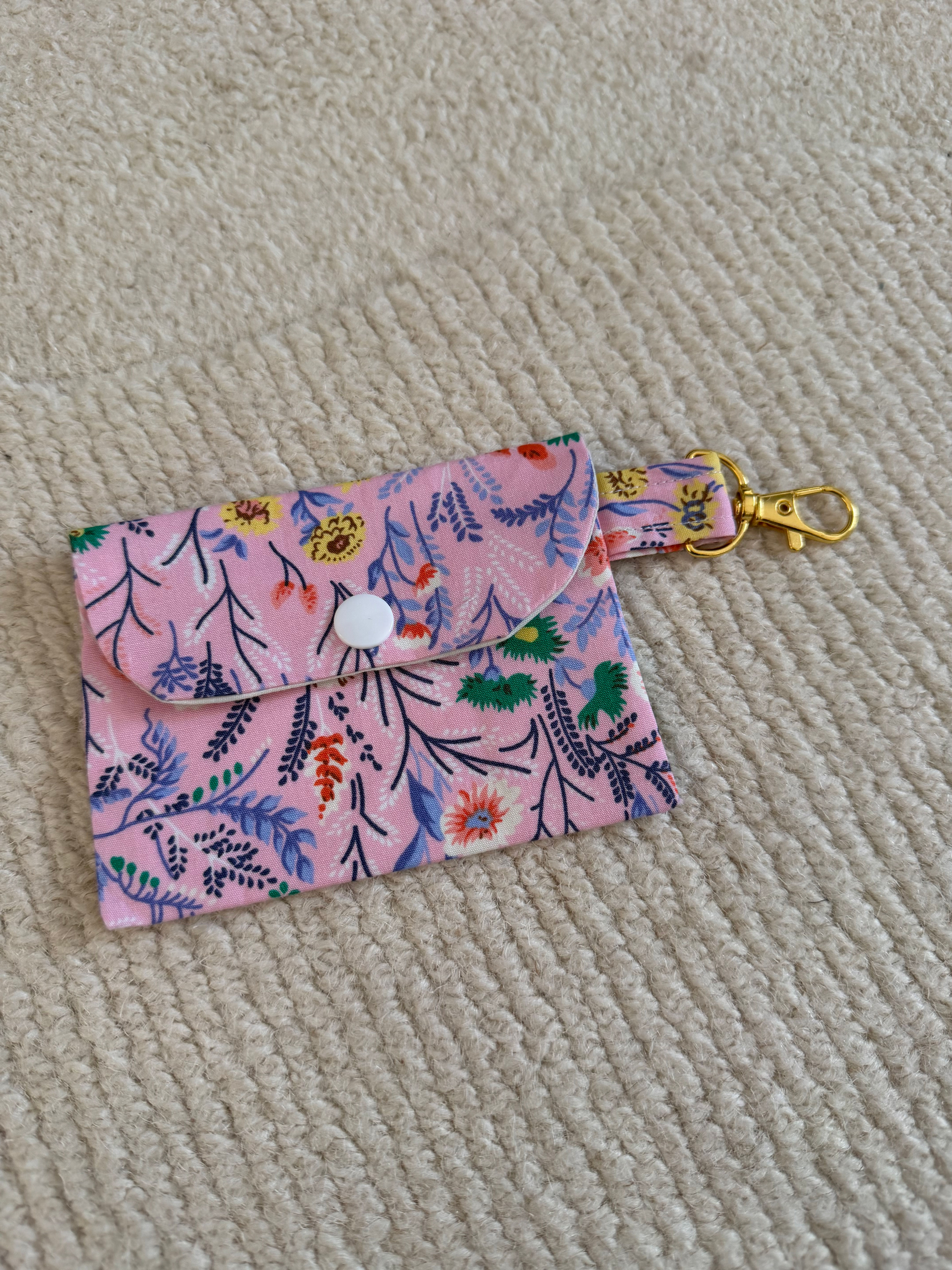 Pinks and purple floral snap pouch
