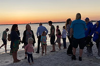 Surfside Church members on a beach
