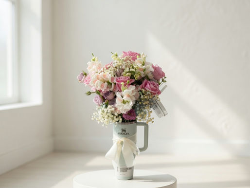 A Stanley Quencher flower arrangement