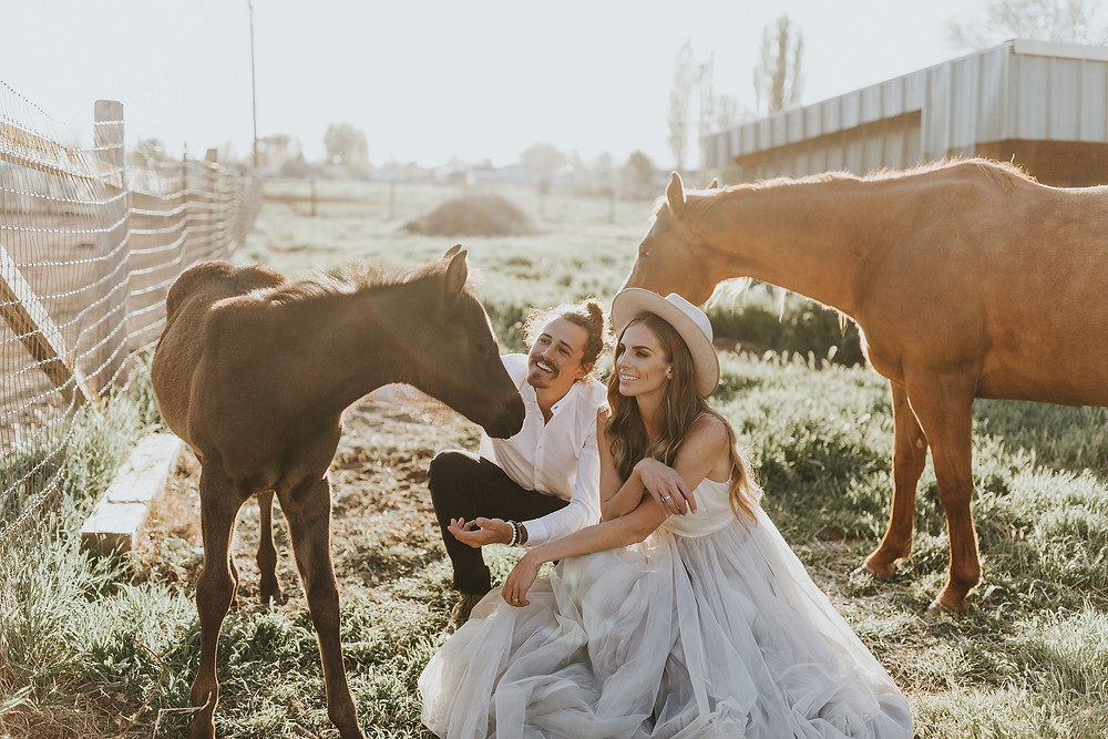 Couple with their horses.