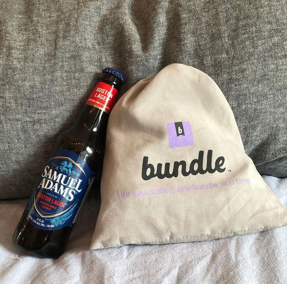There is a photo of a Bundle bag with the word Bundle and "life celebrated, one bundle at a time" There is a Sam Adams beer next to it.