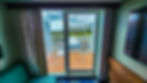Sliding Glass Door to Balcony in Ocean Suite 9450 on Carnival Celebration