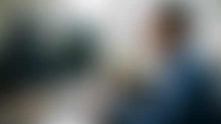 Man searching through his computer on the RuggedCell Savings Calculator