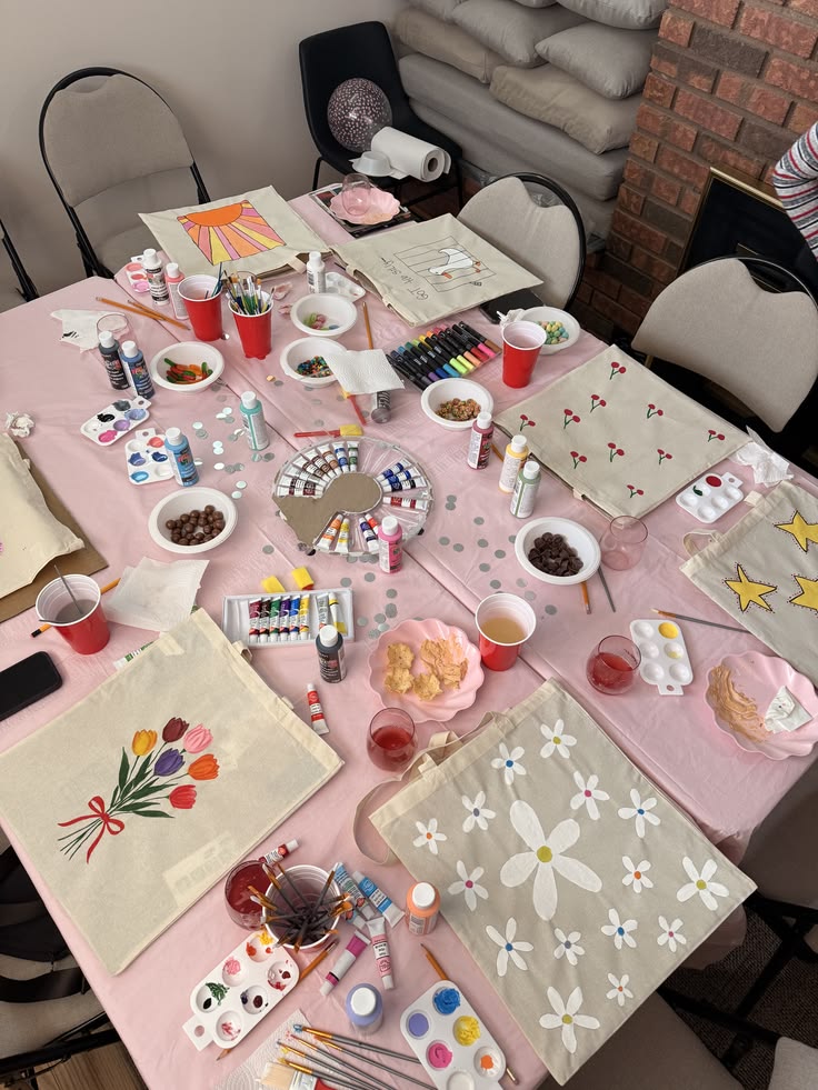 Plain tote bags ready to be painted in a creative crafternoon workshop