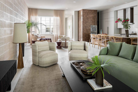 Living Room with Two Love Seats and a Green Sofa – Elegant living room by Vee Merklen Interior Design in Delray Beach, FL, featuring two love seats, a bold green sofa, and a sophisticated open-concept layout.