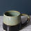 Thumbnail: Hand thrown stoneware pottery mug dark inky blue/brown and light stone blue
