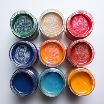 Colourful Gouache jars with fingerprints