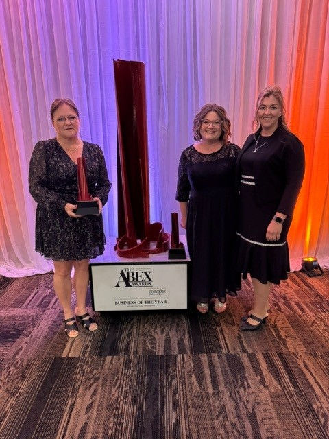 Dr. Michelle Pavloff receiving a Non-Profit Impact Award