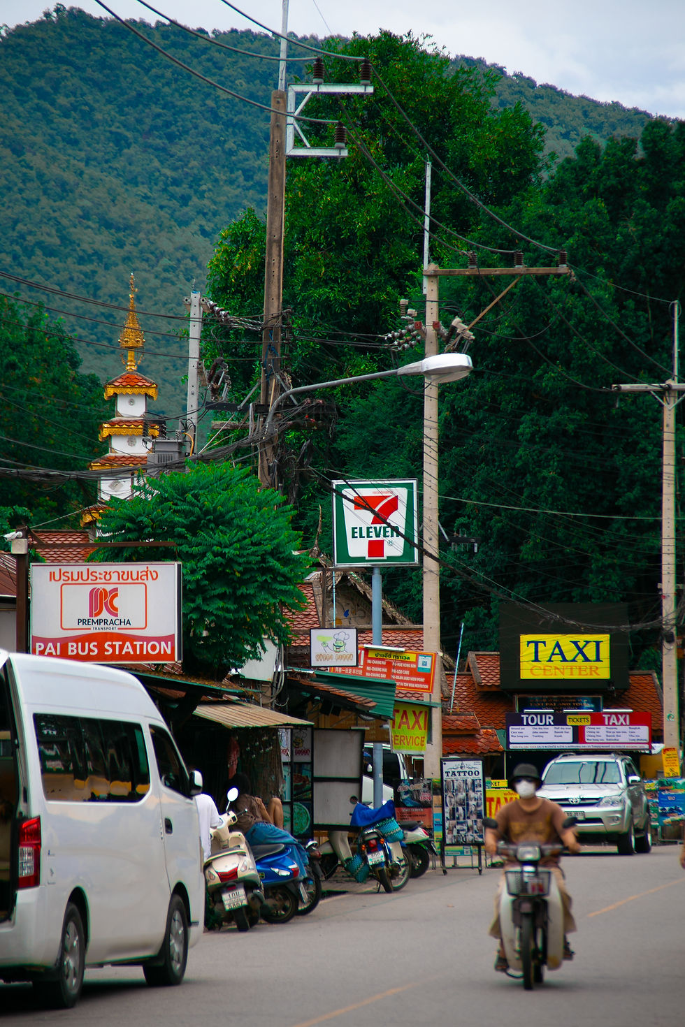 a seven eleven sign on Pai high street, Thailand