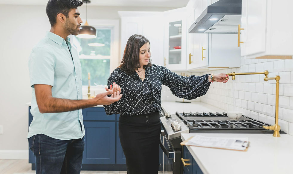 Real estate agent showing a modern home interior to a buyer in Markham — professional property tour photography by Air Unlimited