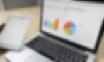 Realtor reviewing property website analytics on a laptop showing Ottawa listing engagement data