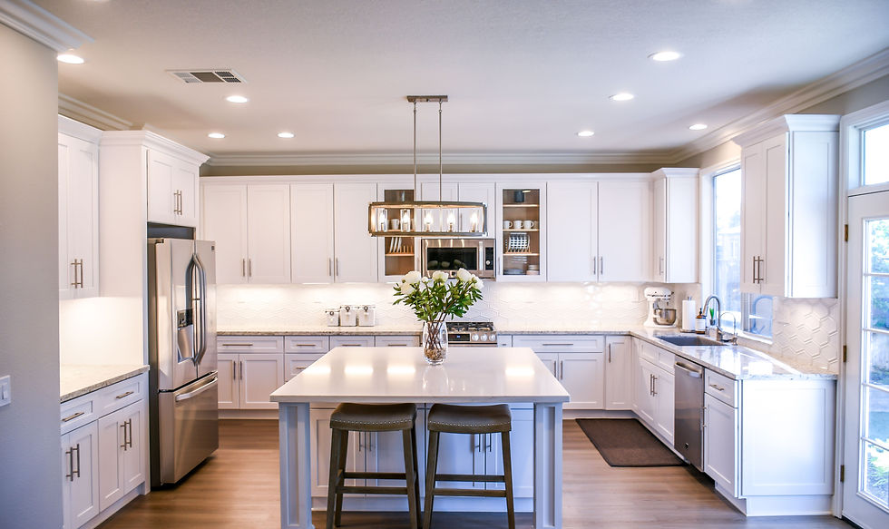 Bright white kitchen with island professionally photographed for a Newmarket real estate listing, edited and delivered within 24 hours of the shoot