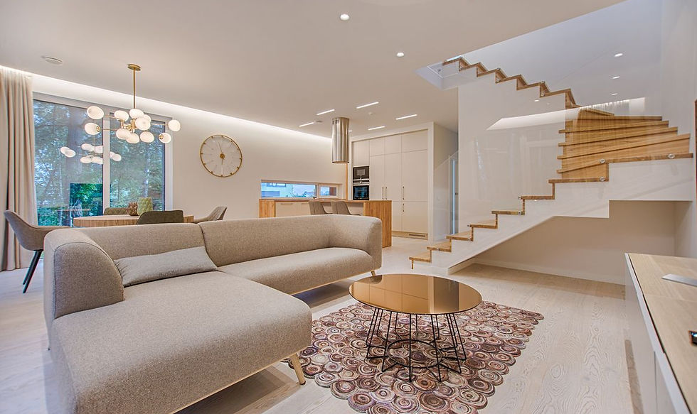 Bright, professionally photographed open-concept living room in a Surrey BC home — balanced natural light and clean lines that help Fraser Valley listings stand out online