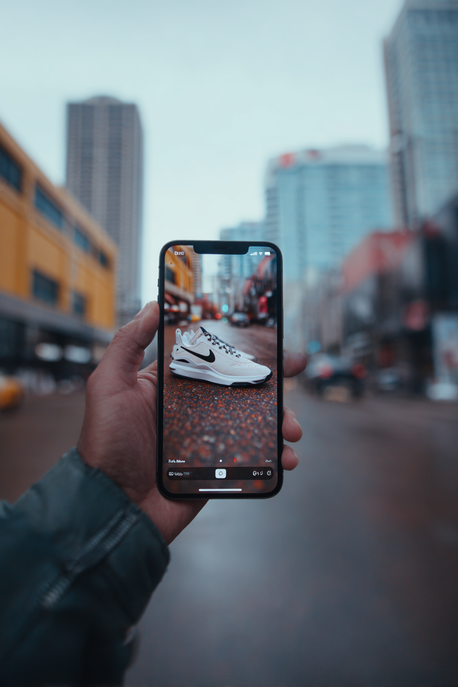 trpstudio_up_close_shot_of_hand_holding_iphone_17_pro_with_ni_eb5c8cef-ac4d-4aeb-bbb5-28b0