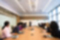 group-of-people-sitting-near-table-11813