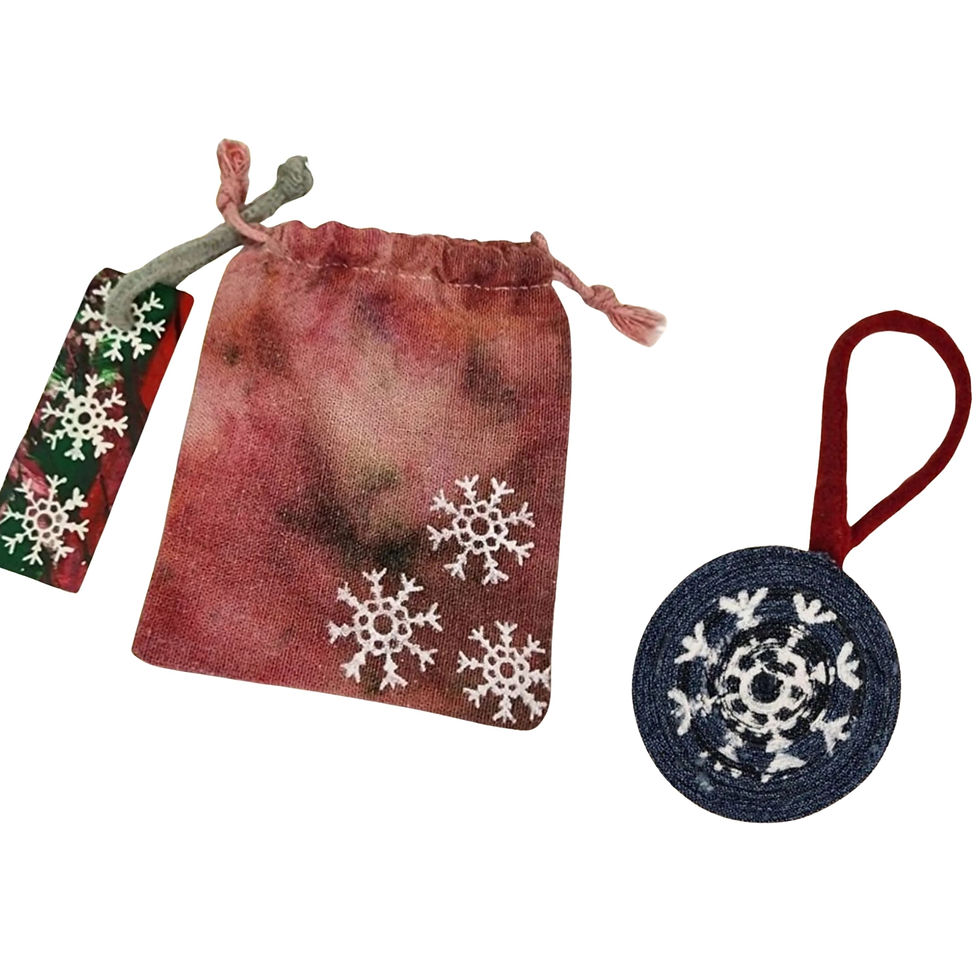 Front view of the Upcycled Denim Ornament, highlighting the screen-printed Snowflake design. (Condition: Handmade/Eco-Friendl