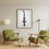 Thumbnail: Bright living room featuring the South Wedge Rochester Art Print framed above two green armchairs and a modern globe pendant