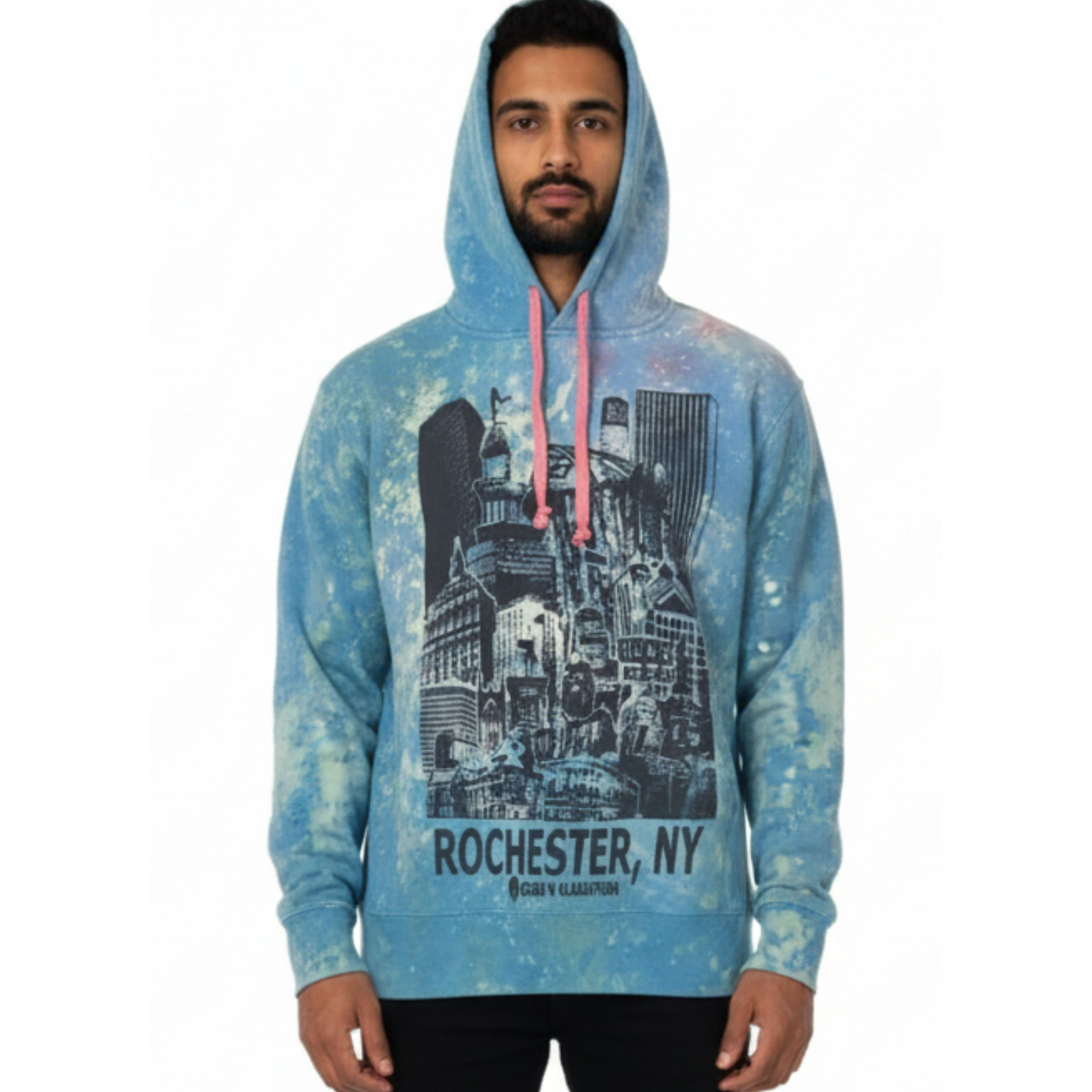 Front view of the XS light blue bleach-dyed pullover hoodie featuring the detailed Rochester Cityscape graphic and a model.