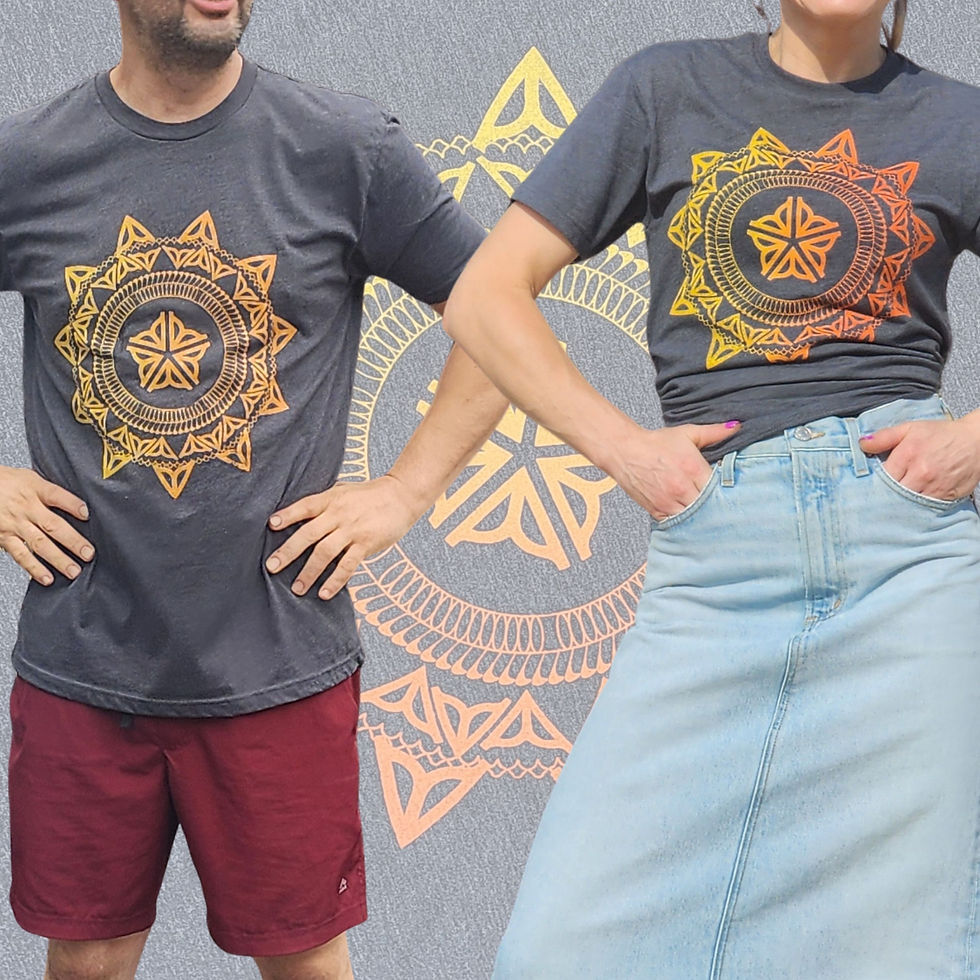 Two models wearing the ROC Mandala Graphic Unisex Tee; one in red shorts and one in a light wash denim skirt.