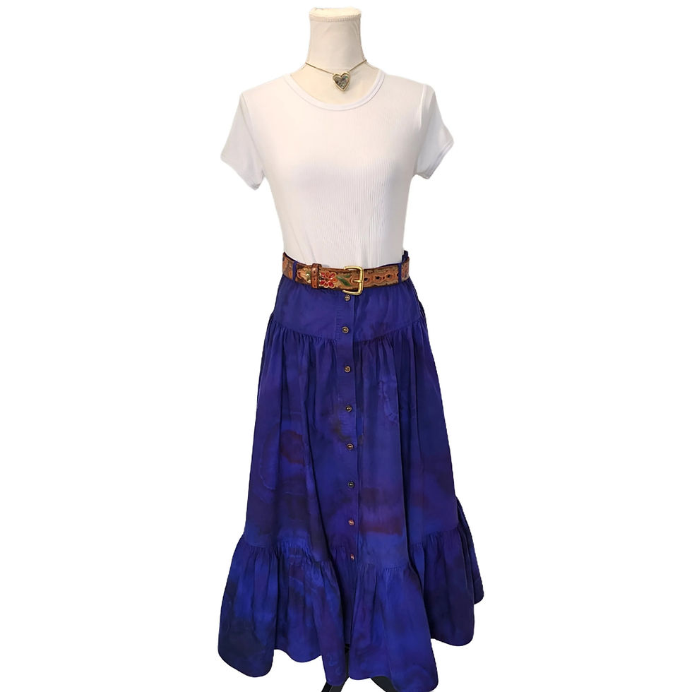 Front view of the Vintage Tiered Skirt, showcasing the wood button-down front and the purple/blue tie-dye geode patterns. (Co