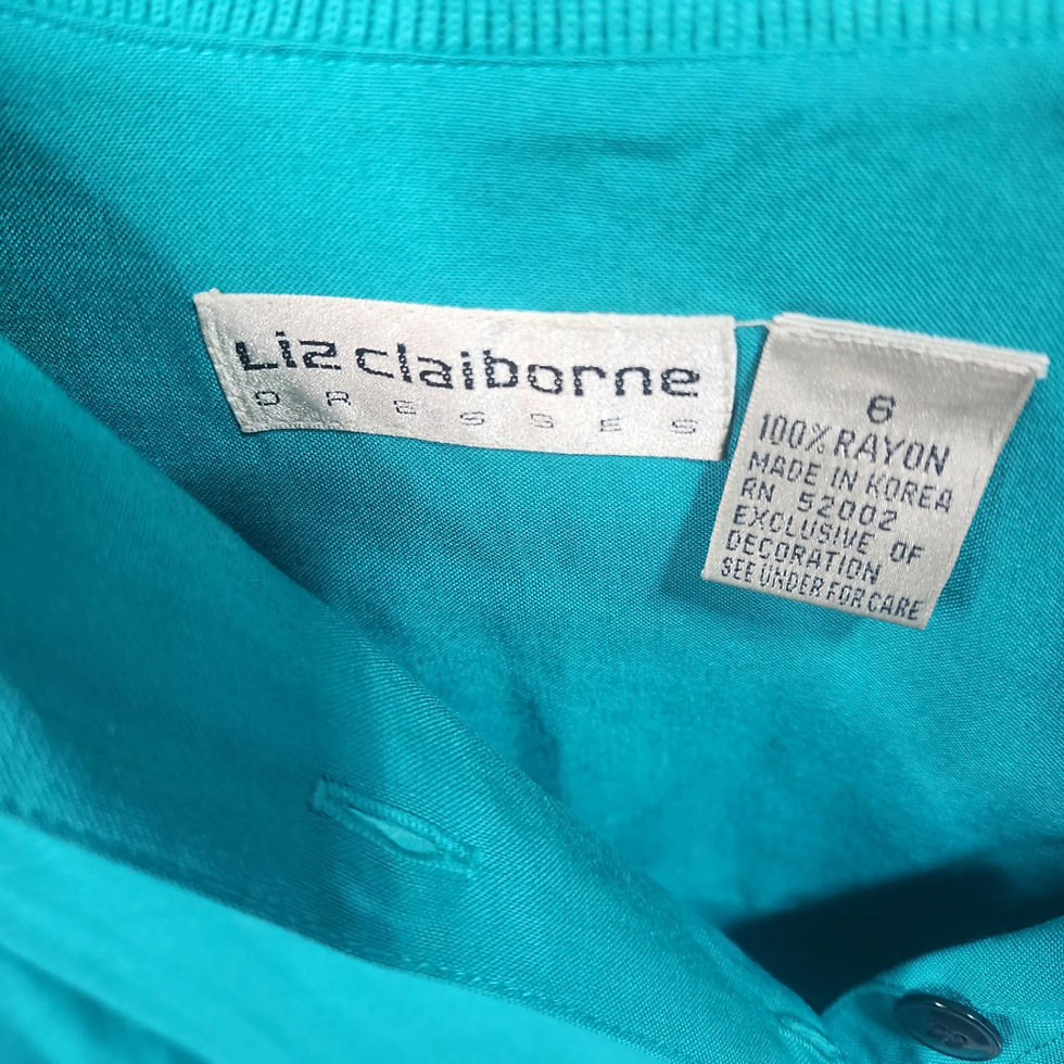 Image of the garment interior, confirming tags were removed. (Material: Cotton Blend)