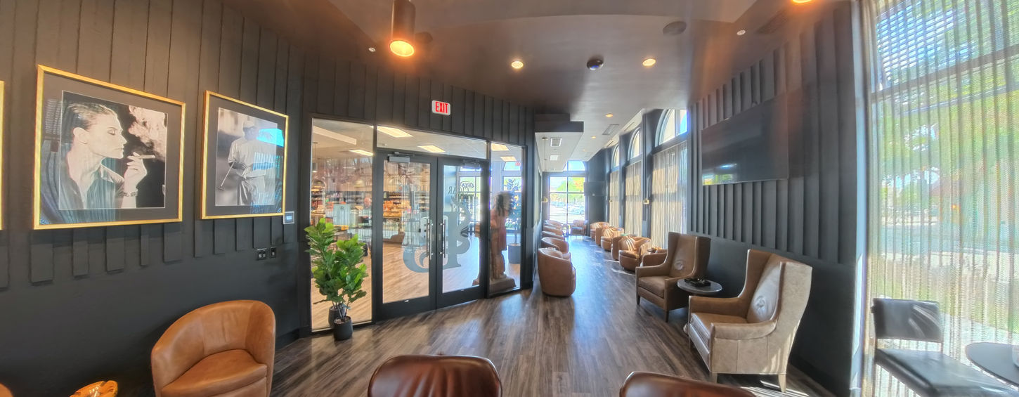 Cigar lounge seating area in Bonita Springs Florida with modern hospitality design.