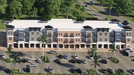 Rear elevation view of Building 5 at East Lake Village with balconies and landscaping.
