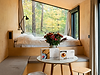 18_raus-cabin_boxes-in-room.png