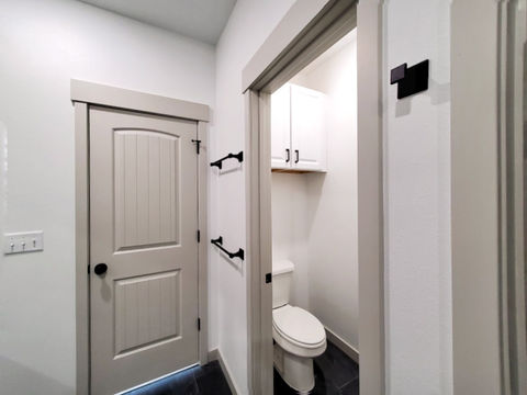 Matthews Master Bathroom. Privacy commode
Storage
Tile floors