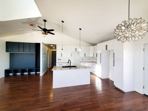 Oxford Kitchen and Dinning room. Vaulted ceiling, Marble counter tops, skylight, natural oak floors, custom built-in, pendant lighting, ceiling fan.