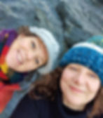 Soo from Top of the Woods camping and glamping site and her friend at Penbryn a National Trust Beach in Ceredigion in winter planning to go wild swimming. Kitted up with woolly hats.
