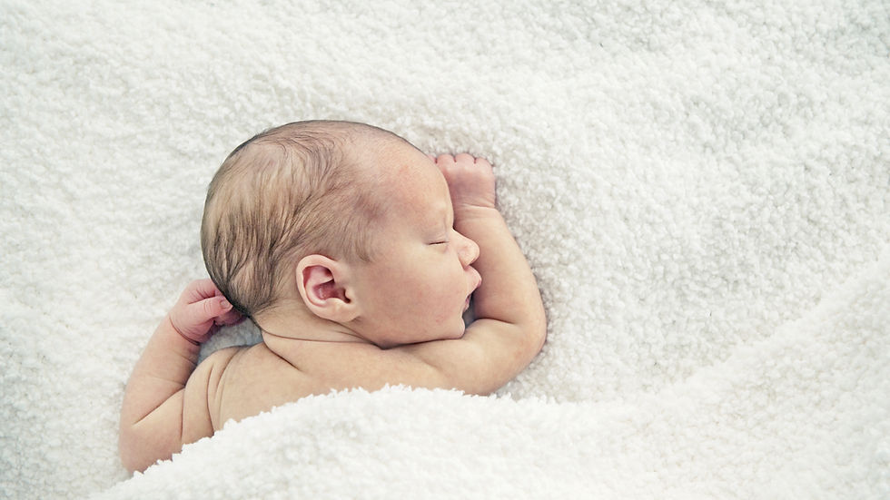 a newborn baby sleeping peacefully