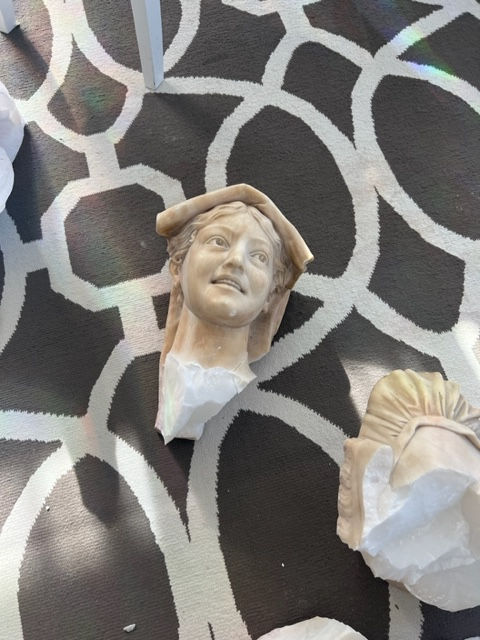 Broken marble bust before repair