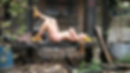 Body positivity model, Elizabeth Kate, posing naked outside the Belt Craft Studios in London